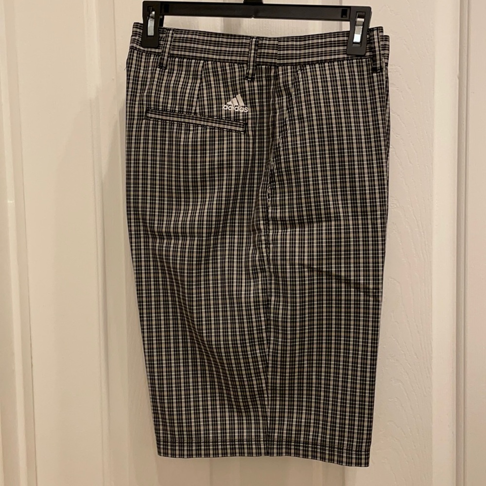 Adidas golf shorts in size 32.